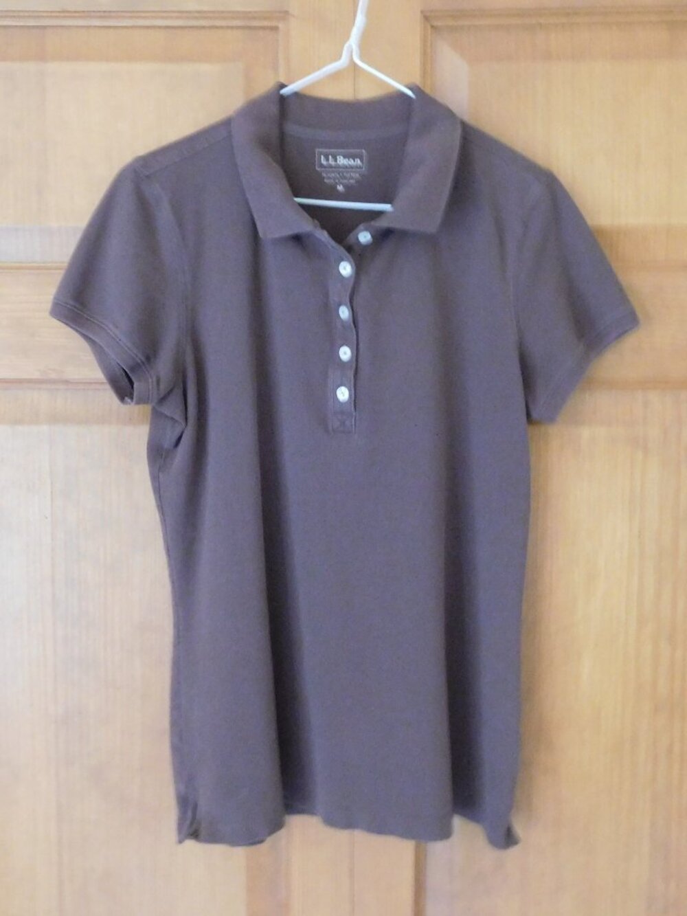 Women's size Medium L.L. Bean polo shirt, brown color, 97% cotton, 3% lycra